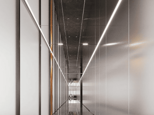 A futuristic, deep vertical corridor featuring reflective surfaces, frosted glass panels, and dramatic linear LED lighting that enhances the extreme perspective