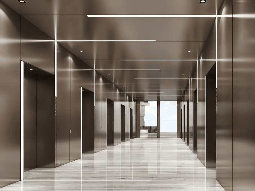 High-end, minimalist corridor with reflective bronze walls, multiple elevator banks, and dramatic linear LED lighting reflected on the polished floor