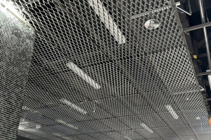 Expanded metal ceiling system metallic ceiling grid with reflective surface